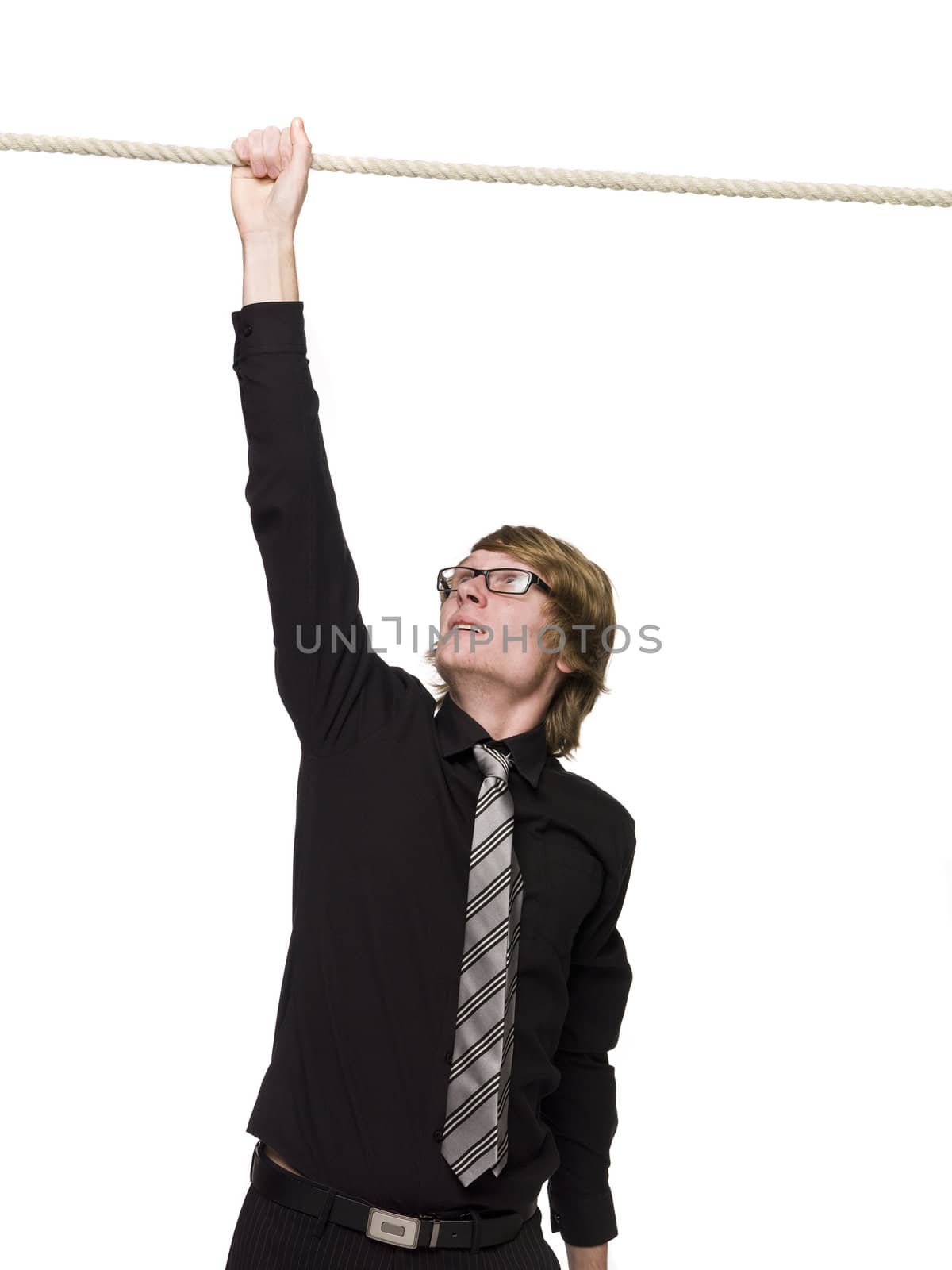 Man hanging in a rope with one hand