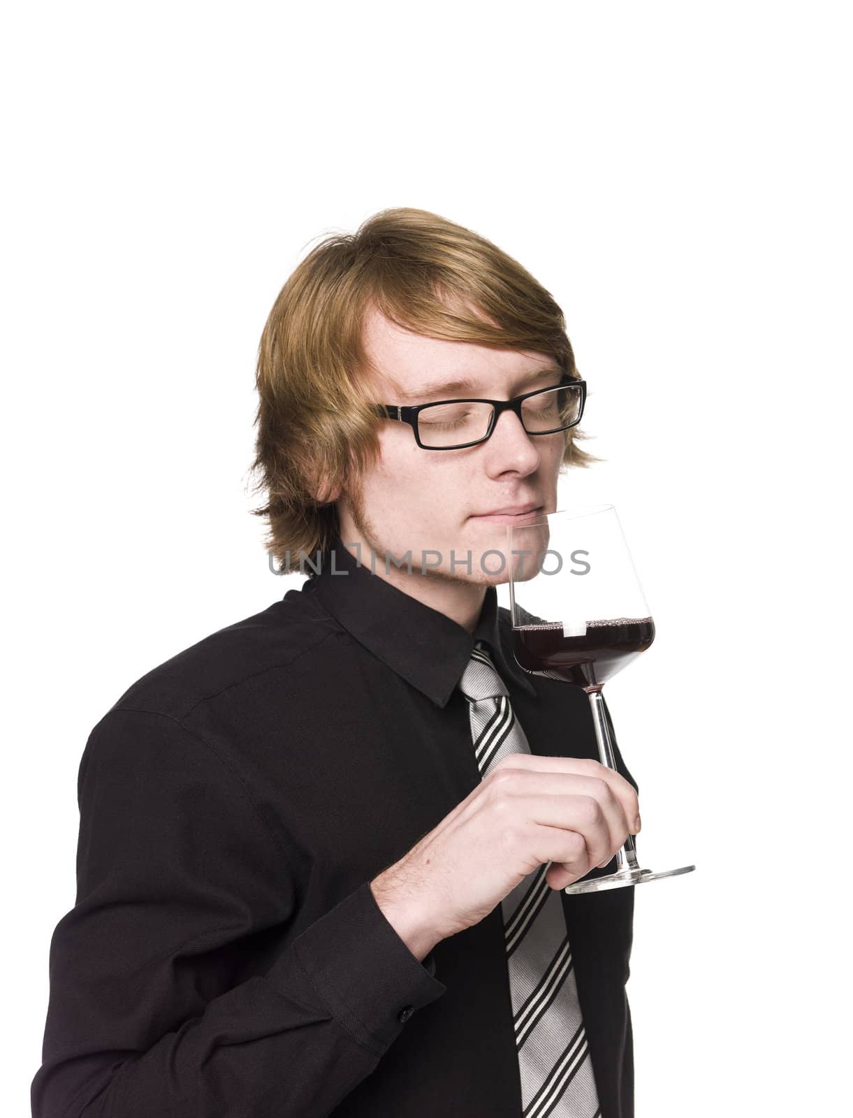 Man smelling wine