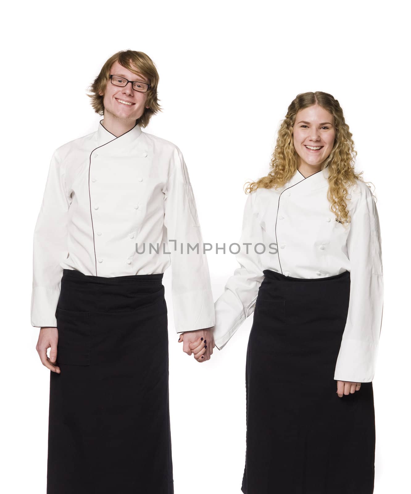Waiter and a waitress holding hands