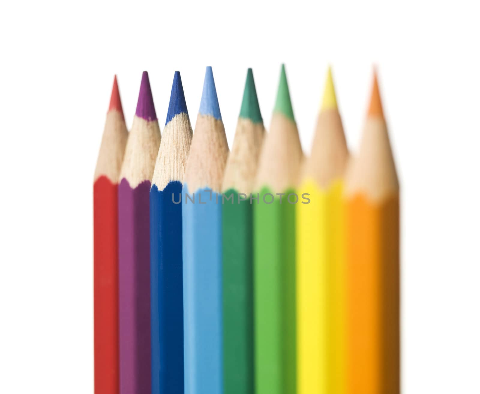 Row of color pencils by gemenacom