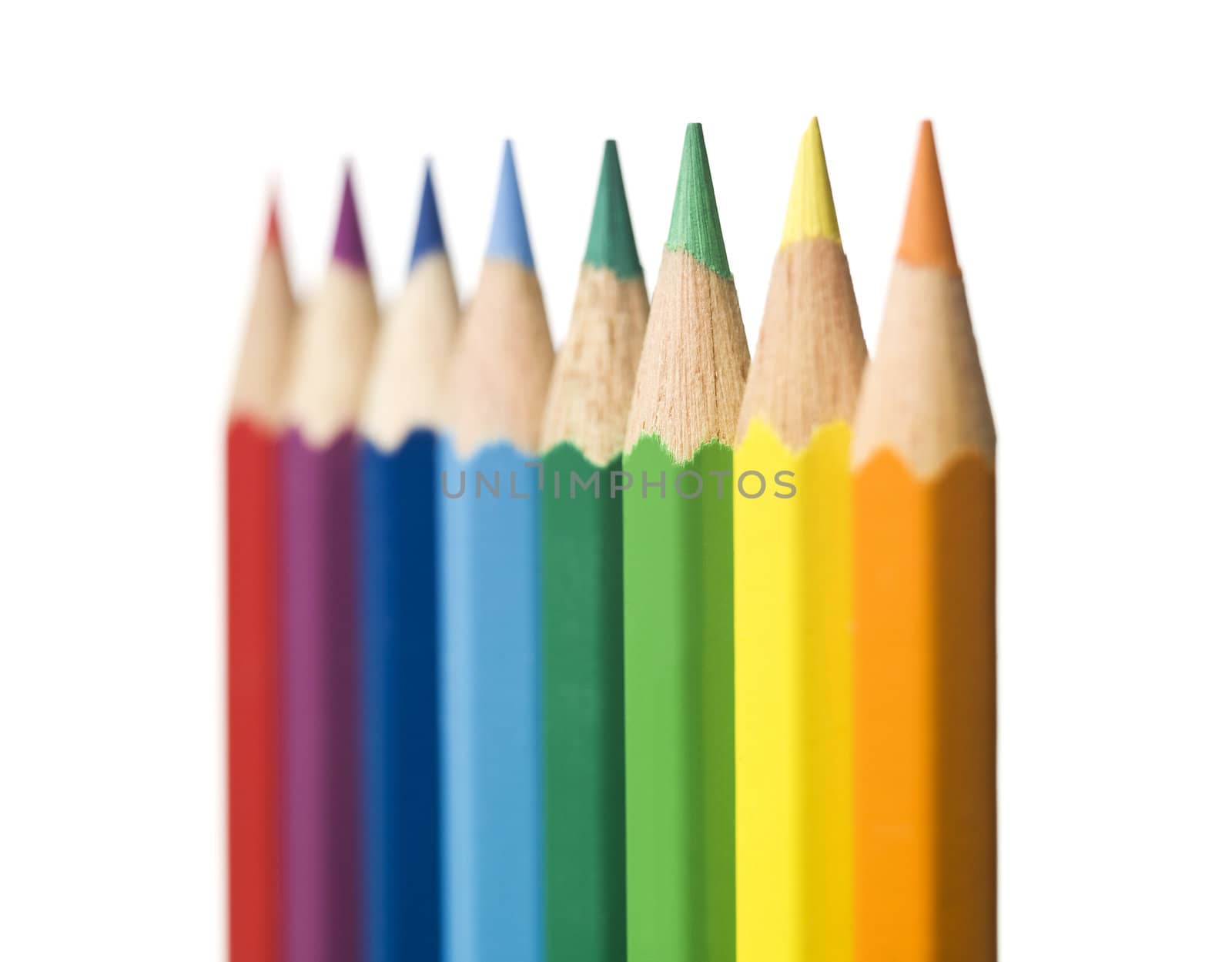 Row of colourd pencils by gemenacom