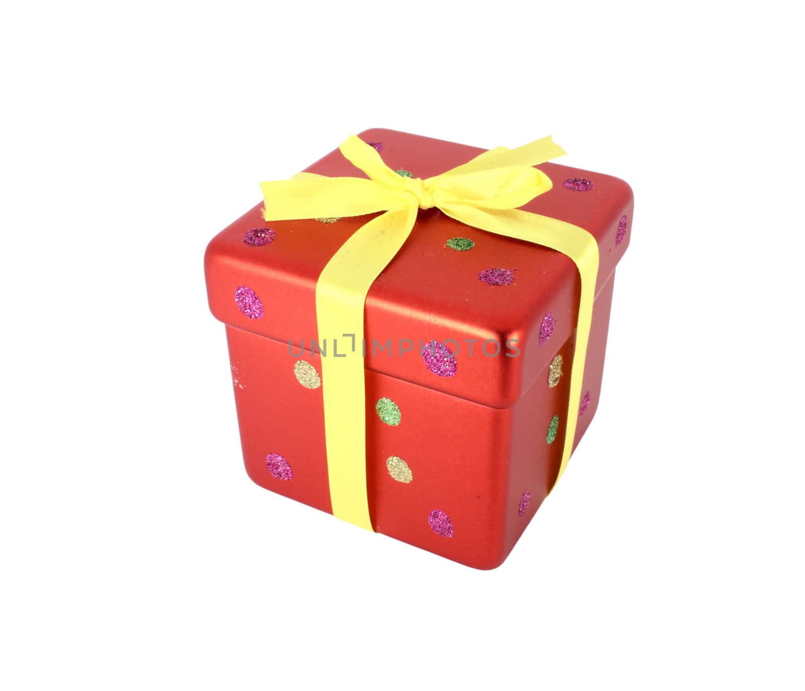 Red gift box with yellow ribbon Christmas decoration isolated on white