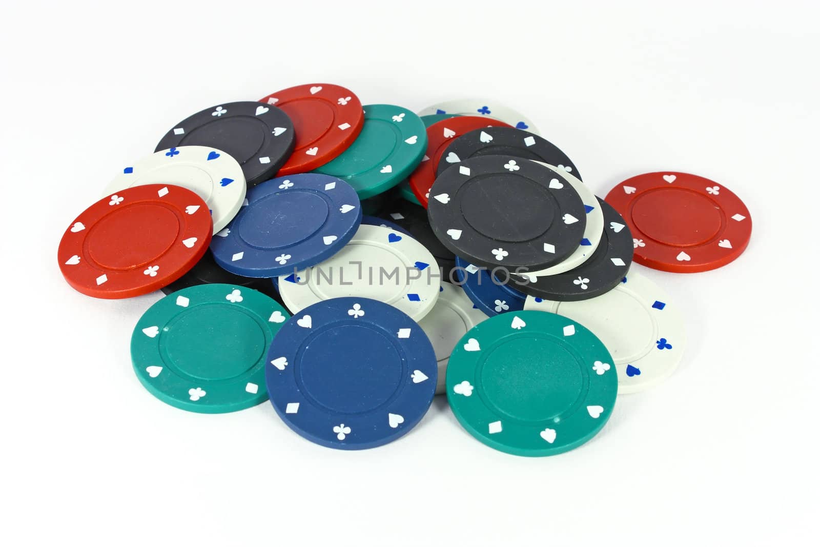 Heap of poker chips isolated om white