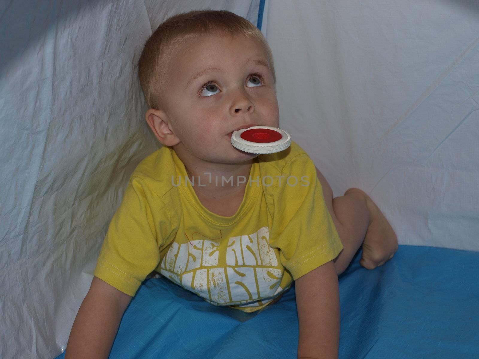 little boy playing in the tent by lulu2626
