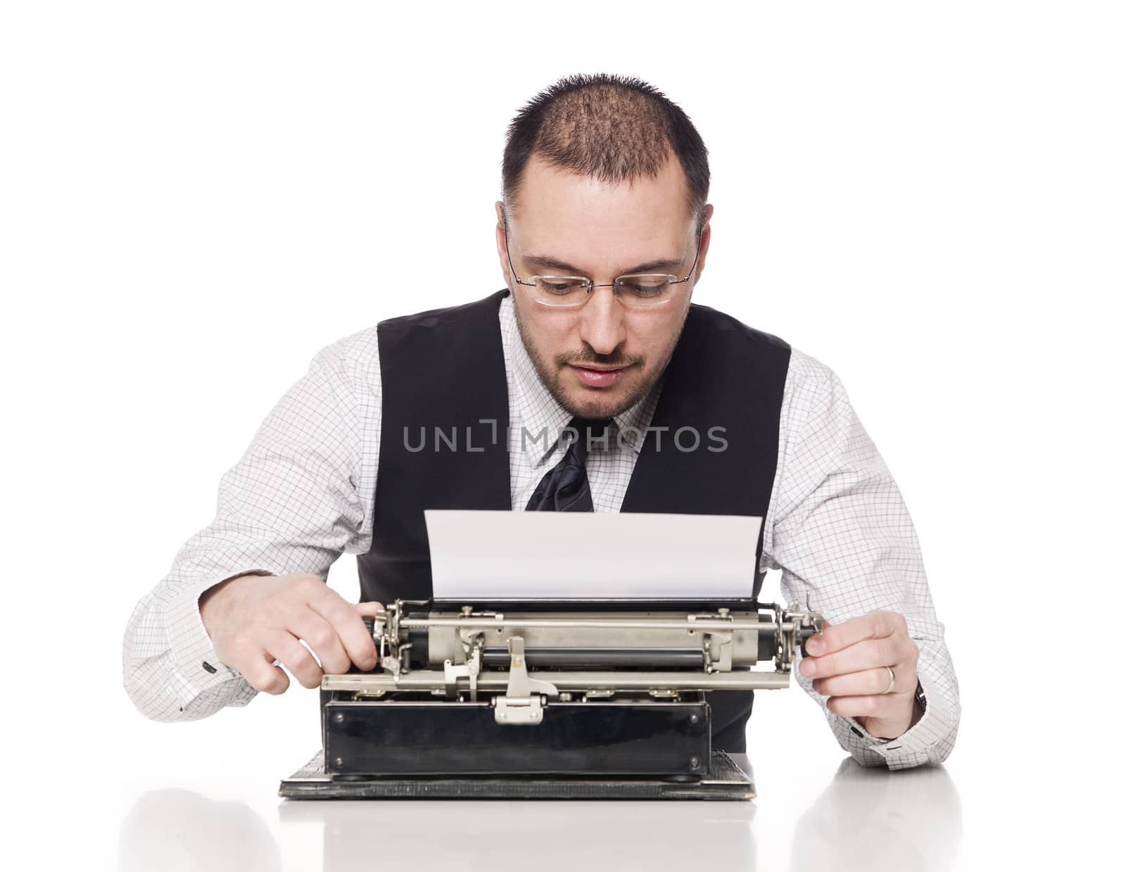 Man writing on a vintage typewriter
