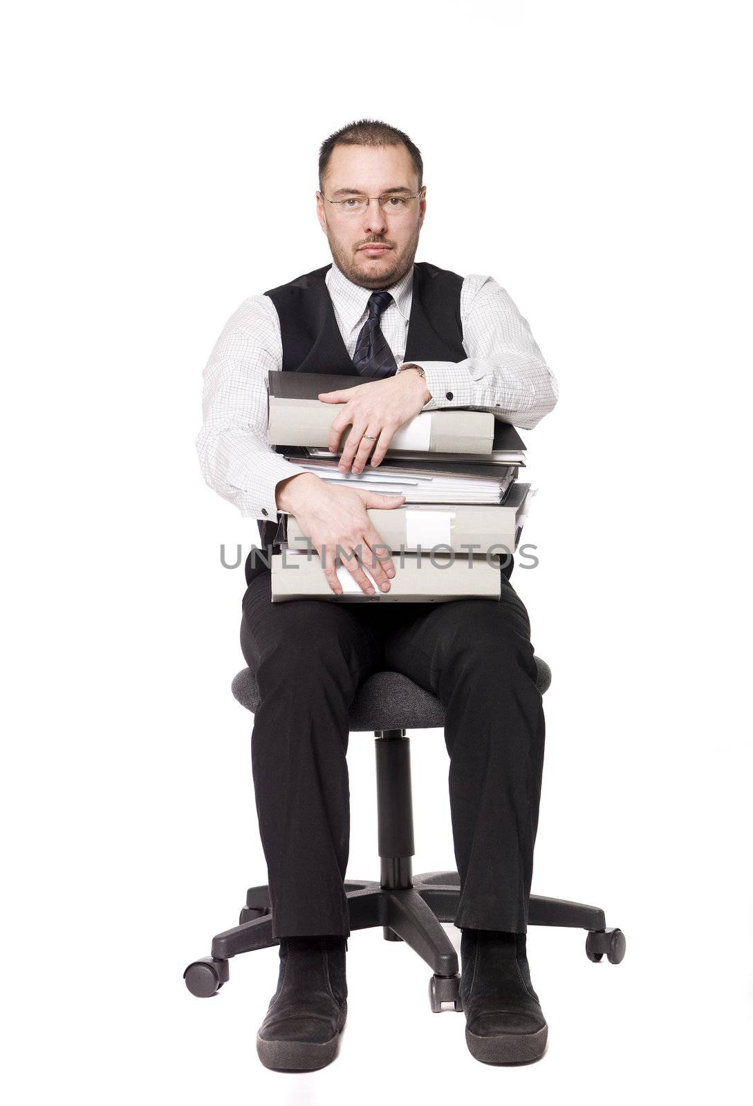 Man with binders sitting on a chair by gemenacom