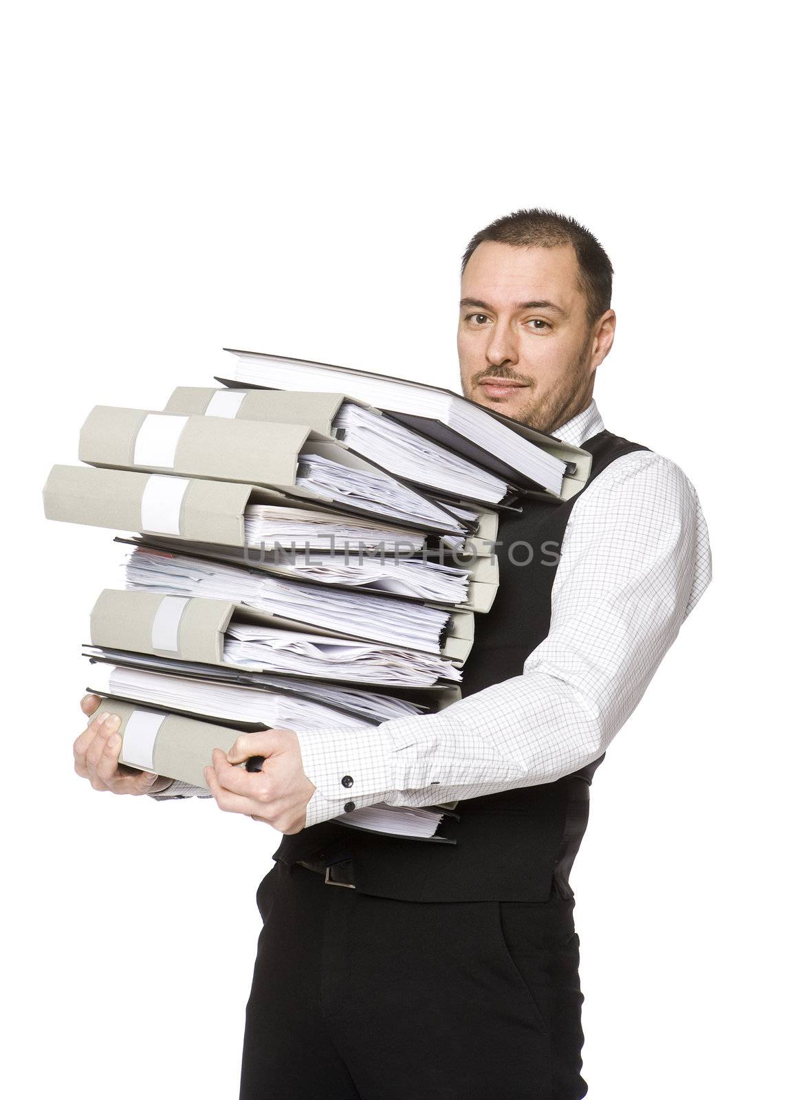Man carrying a pile of binders