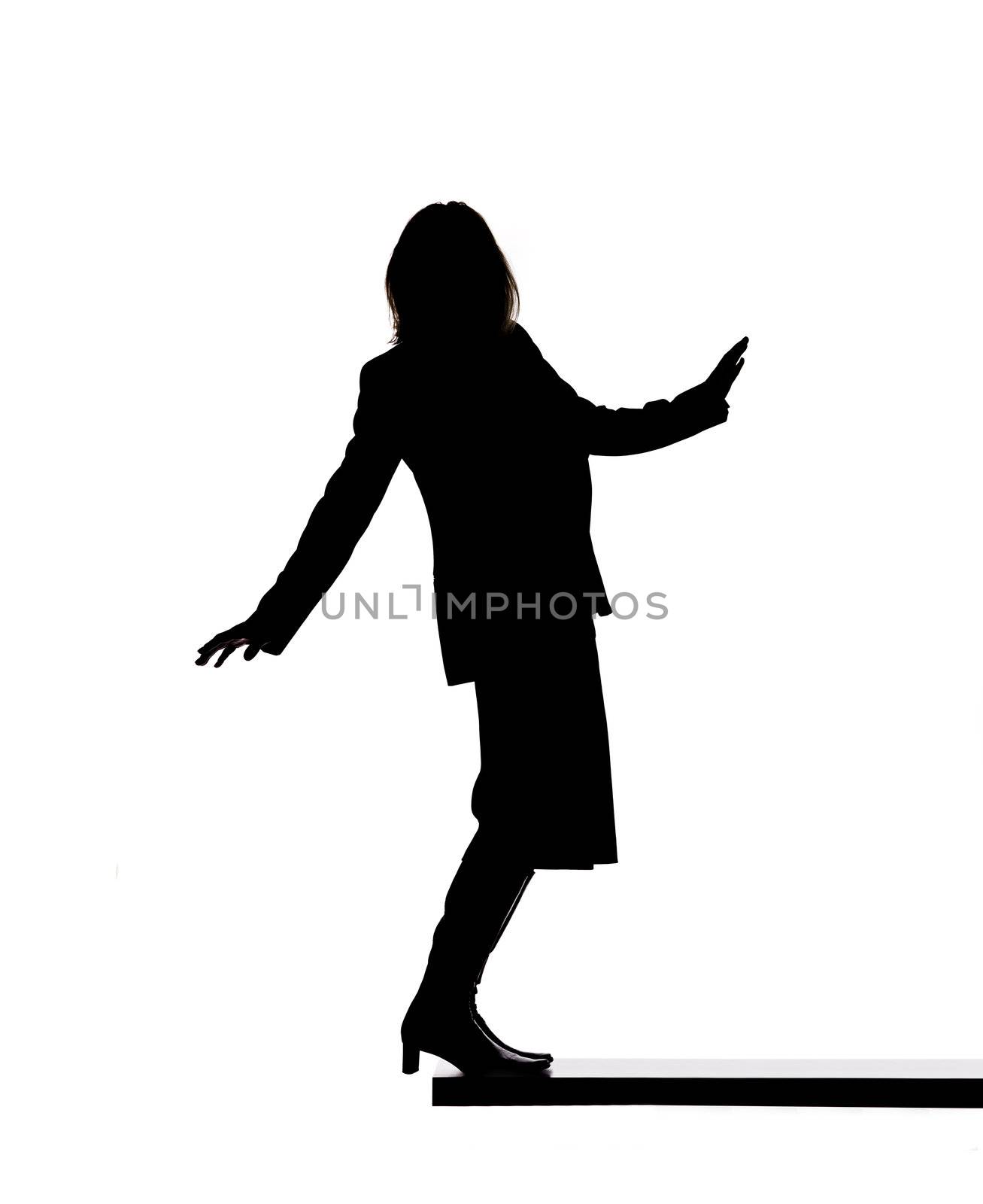Silhouette of a woman on a board by gemenacom