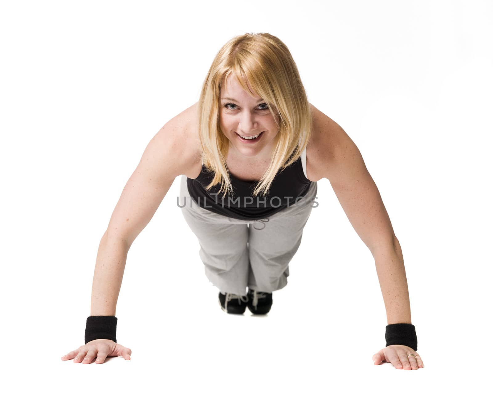 Woman doing push ups by gemenacom
