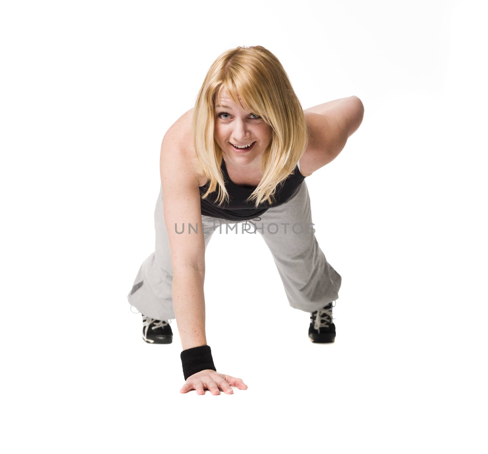 Woman doing push ups by gemenacom