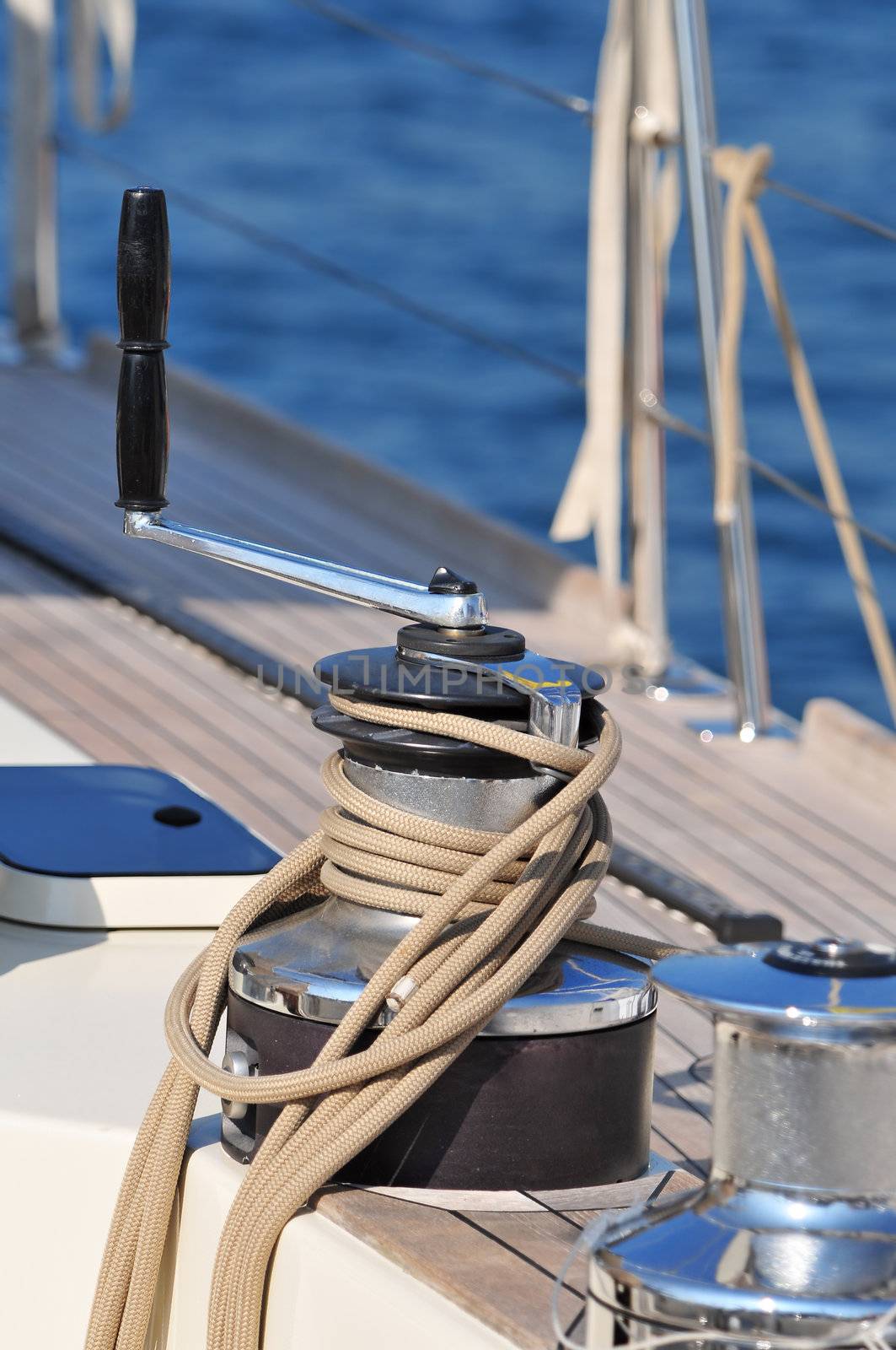 Close-up of winch with rope of a sailboat