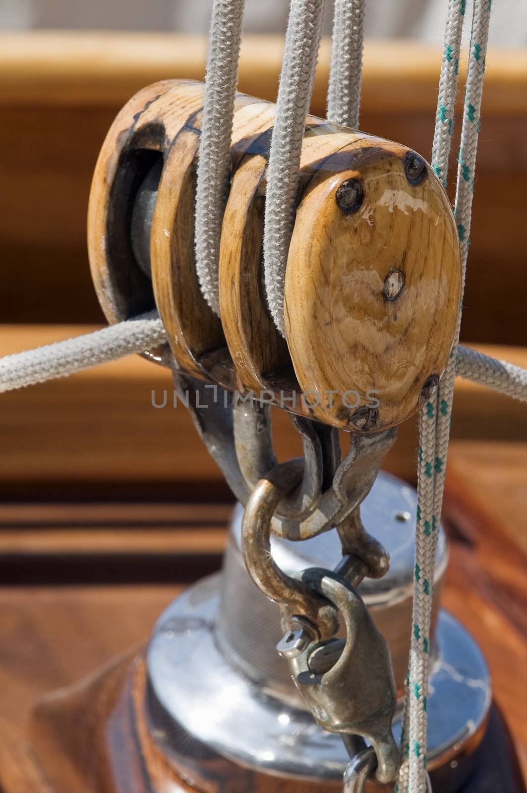 Close-up of a wooden block on a vintage yacht