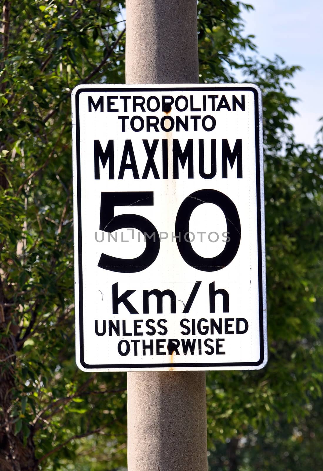 Traffic sign indicating speed limit in the city of Toronto, Canada.