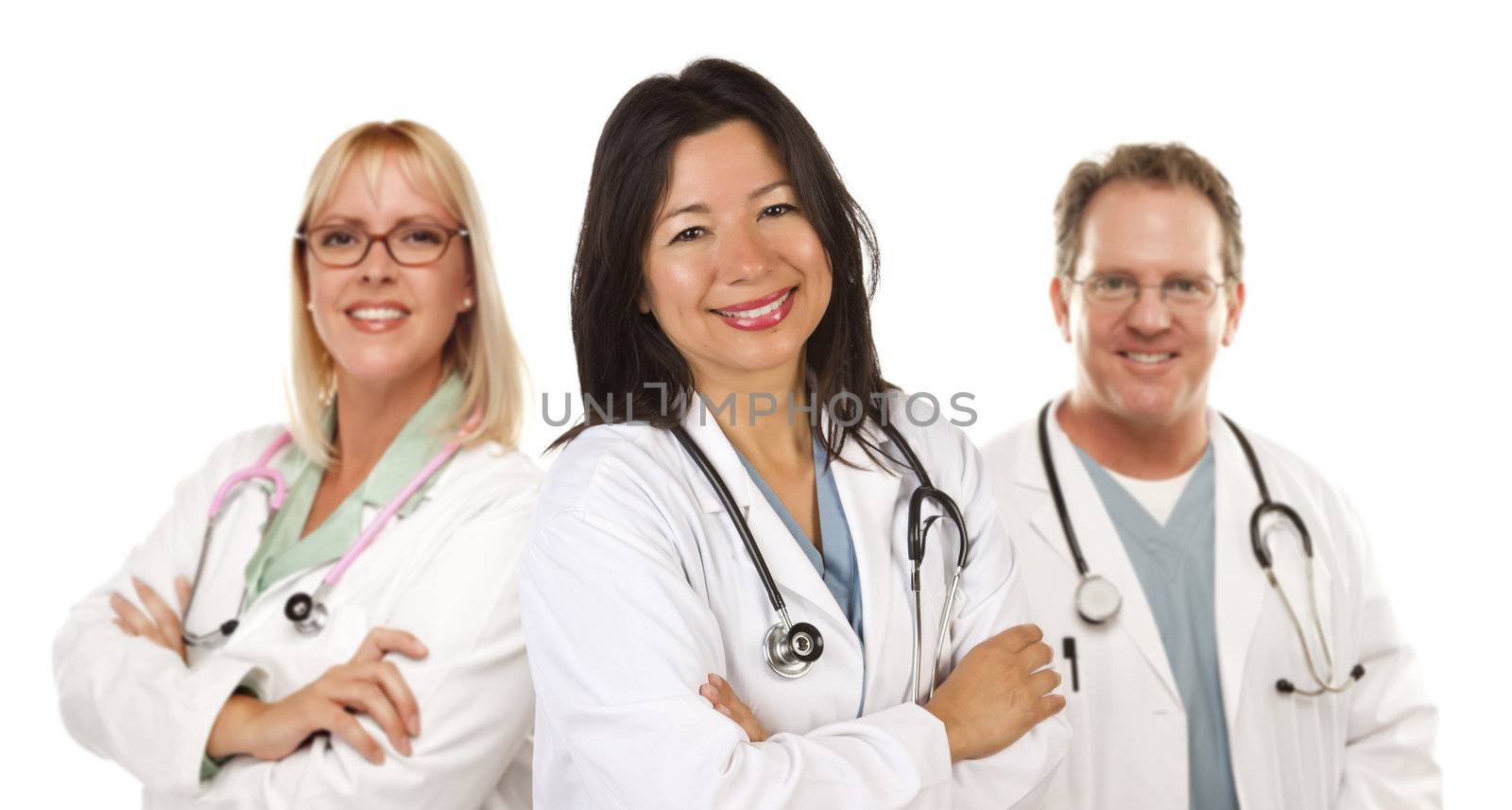 Friendly Hispanic Female Doctor and Colleagues Isolated on a White Background.