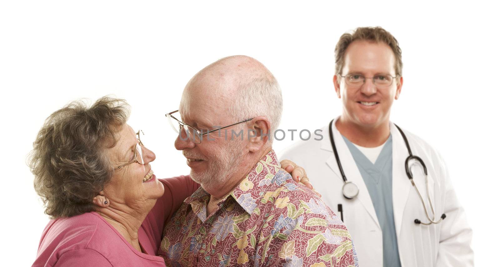 Happy Loving Senior Couple with Smiling Medical Doctor or Nurse Behind Isolated on a White Background.