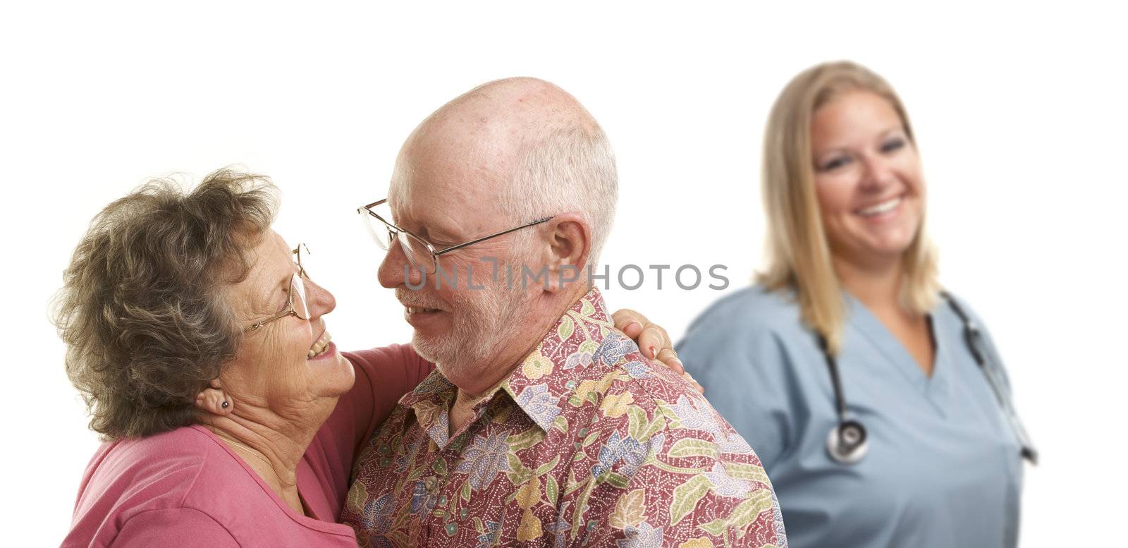 Happy Loving Senior Couple with Smiling Medical Doctor or Nurse Behind Isolated on a White Background.