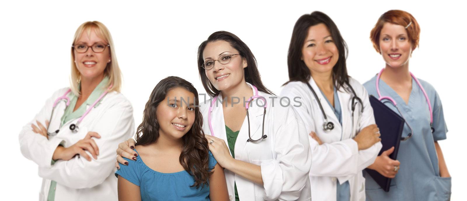 Hispanic Female Doctor with Child Patient and Colleagues Behind by Feverpitched