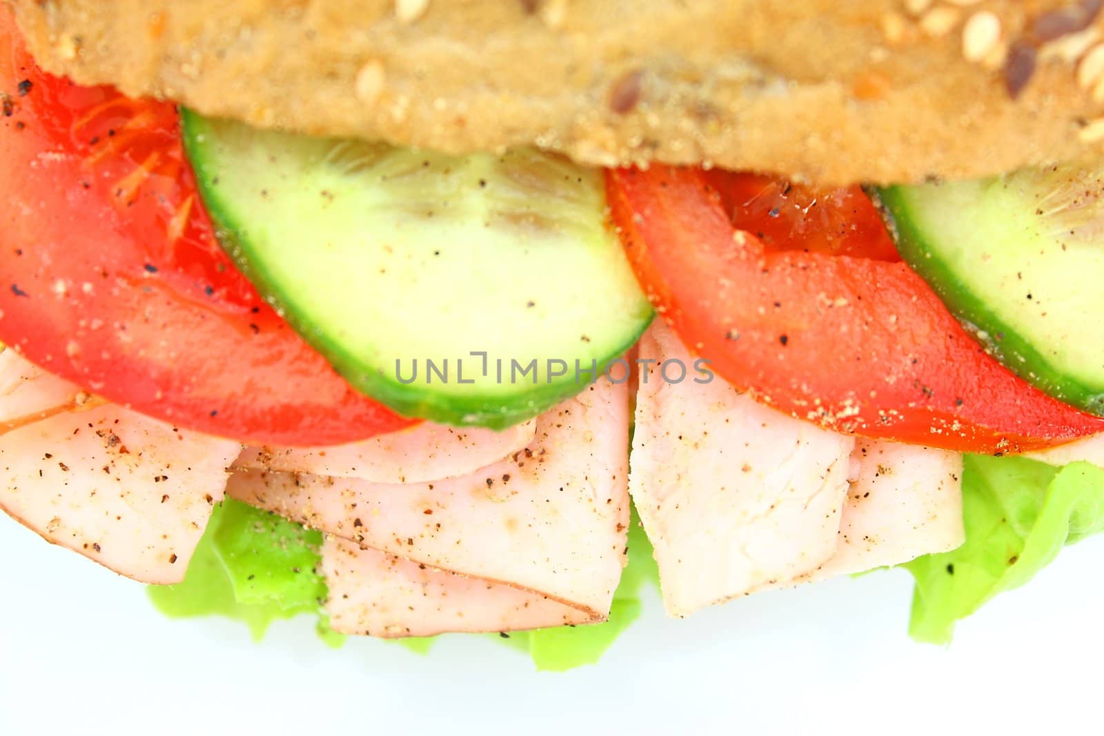 Fresh sandwich with ham and cheese and vegetables