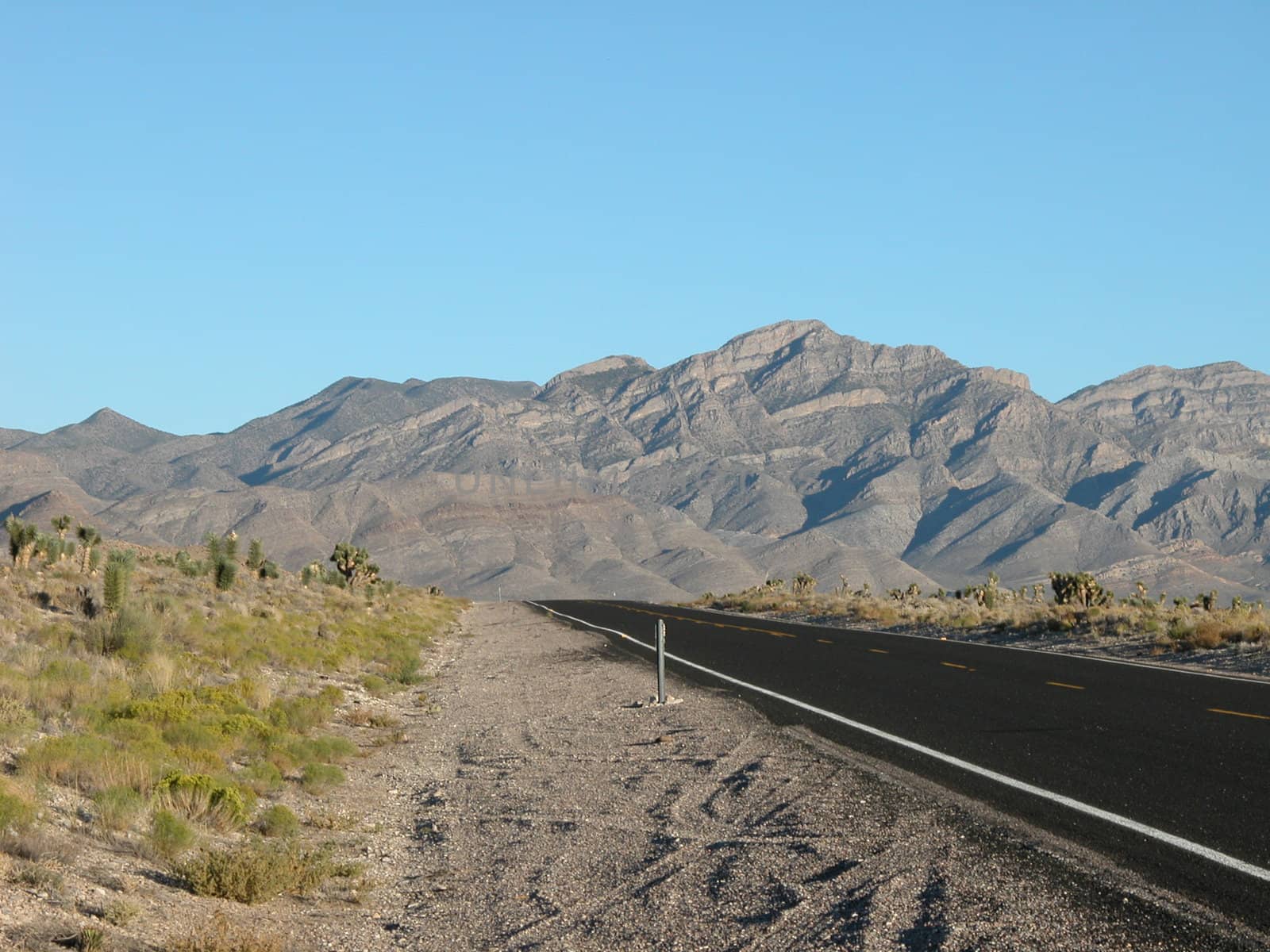 Deserted highway in a Nevada summer afternoon