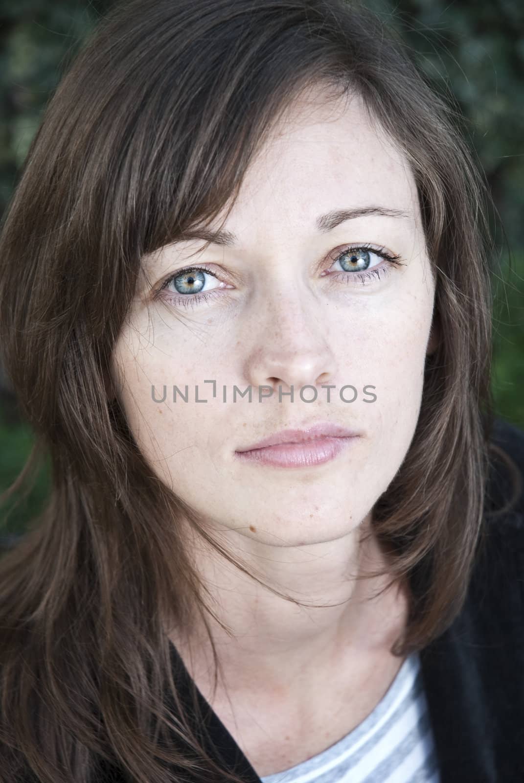 Portrait of young woman looking confident.