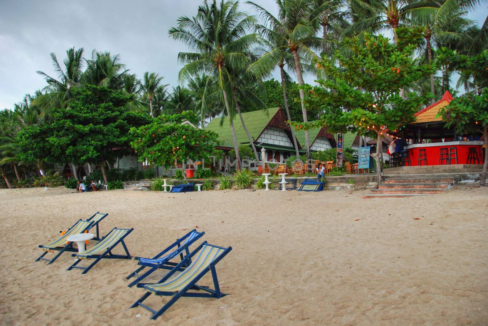 Deckchairs on the beach after sunset, Koh Samui