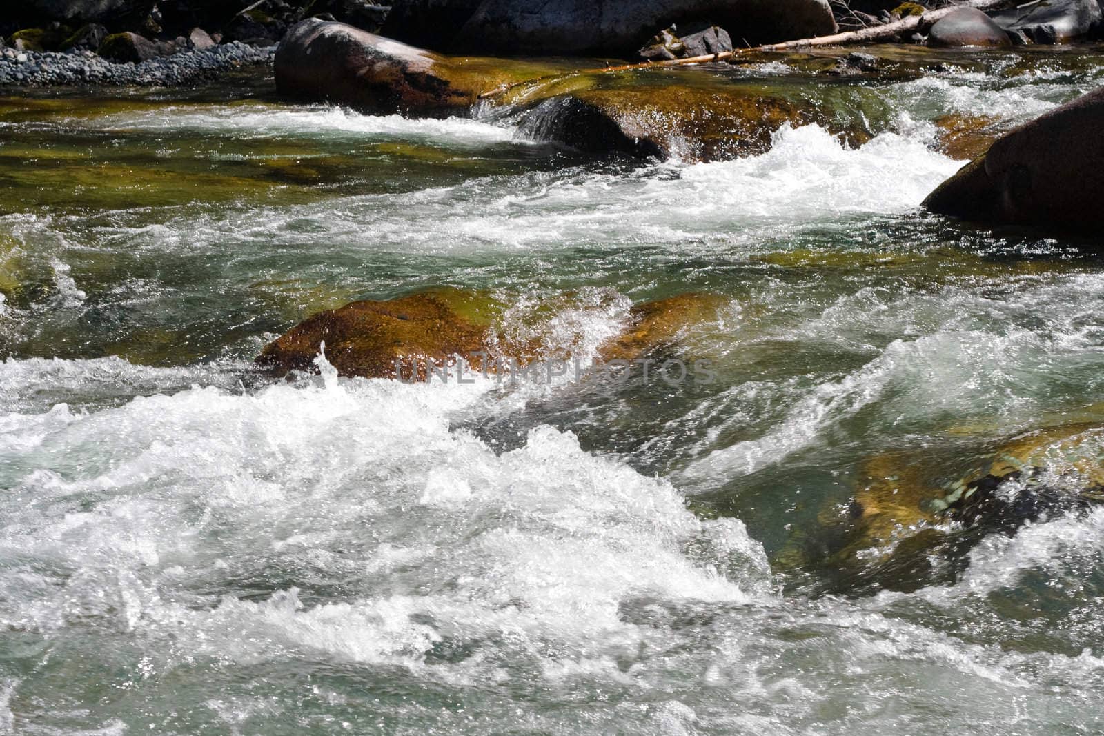 big stones in the stream 
