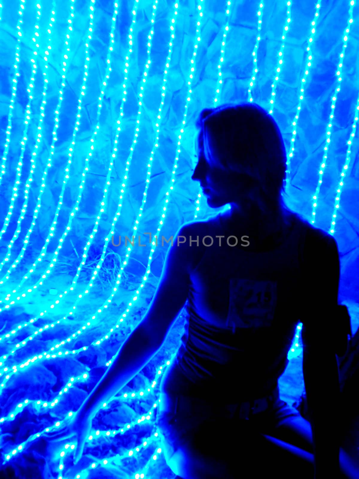 Silhouette of the girl in neon light by leesa