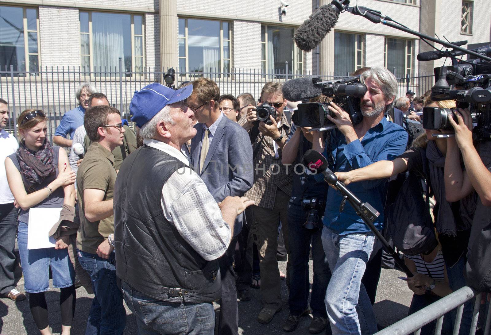 Witness against Mladic talks to the press at the Mladic trial in The Hague
