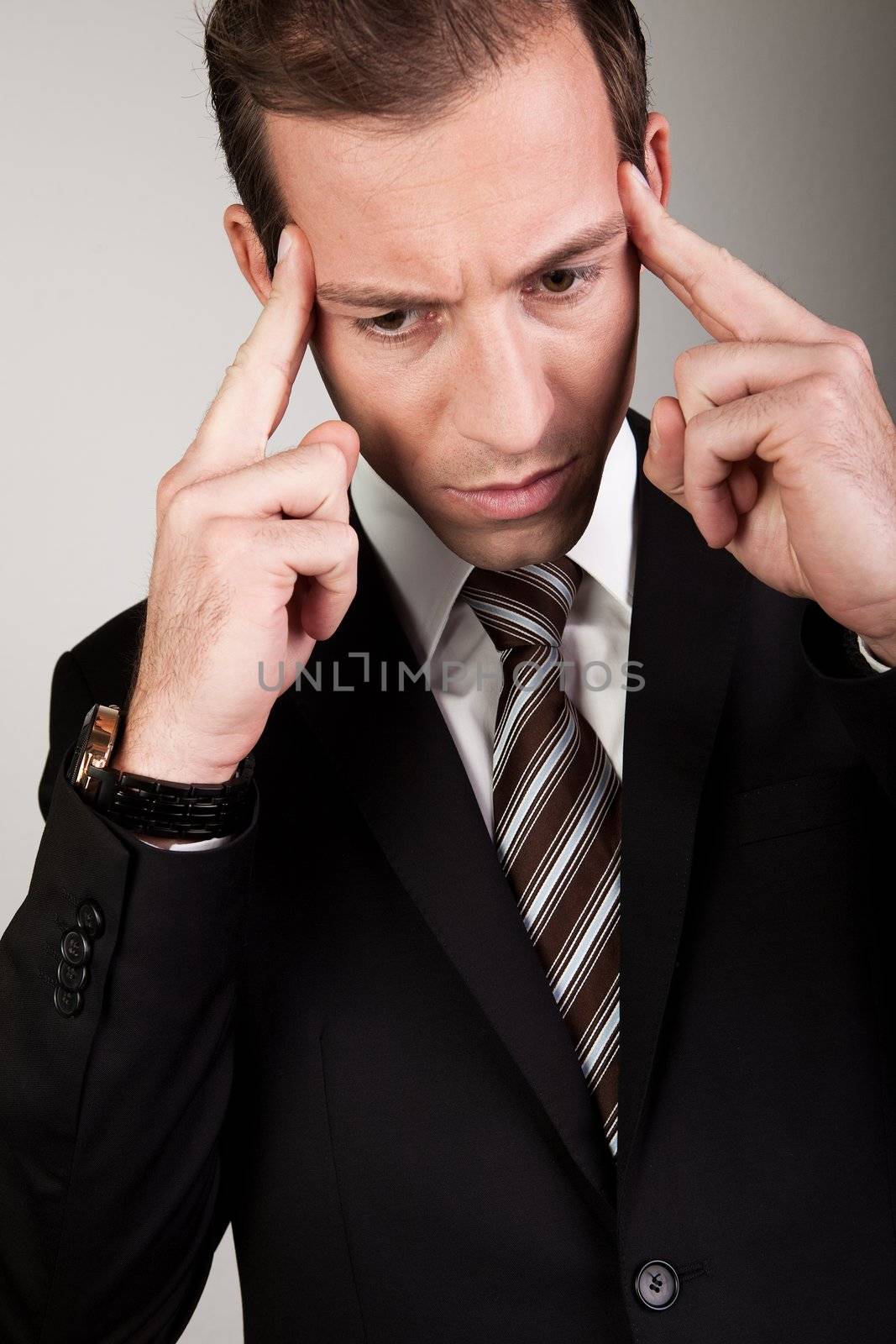 Young Businessman Is Thinking Hard to Solve Problems
