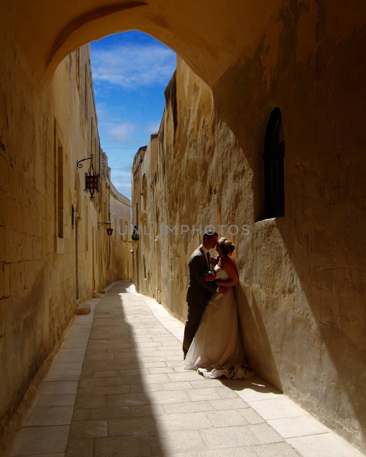 Archway Kiss by PhotoWorks