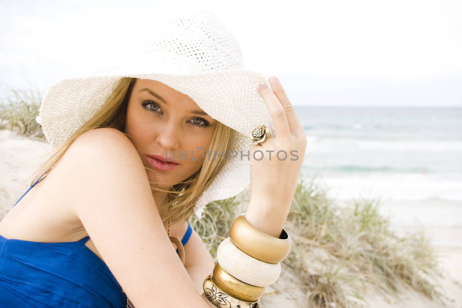 pretty young girl at the beach in summer