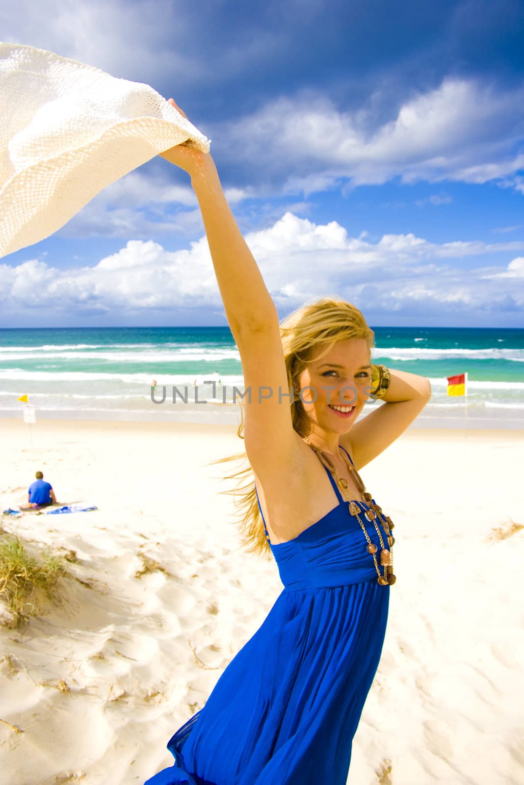 pretty young girl at the beach in summer