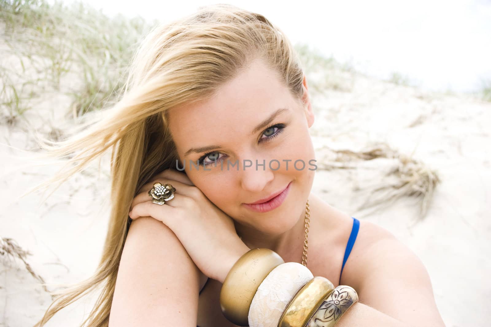 pretty young girl at the beach in summer