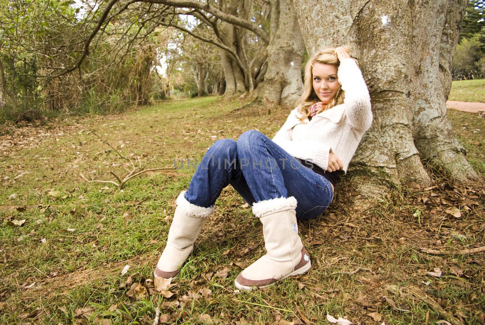 Beautiful girl smiling and relaxing in the park