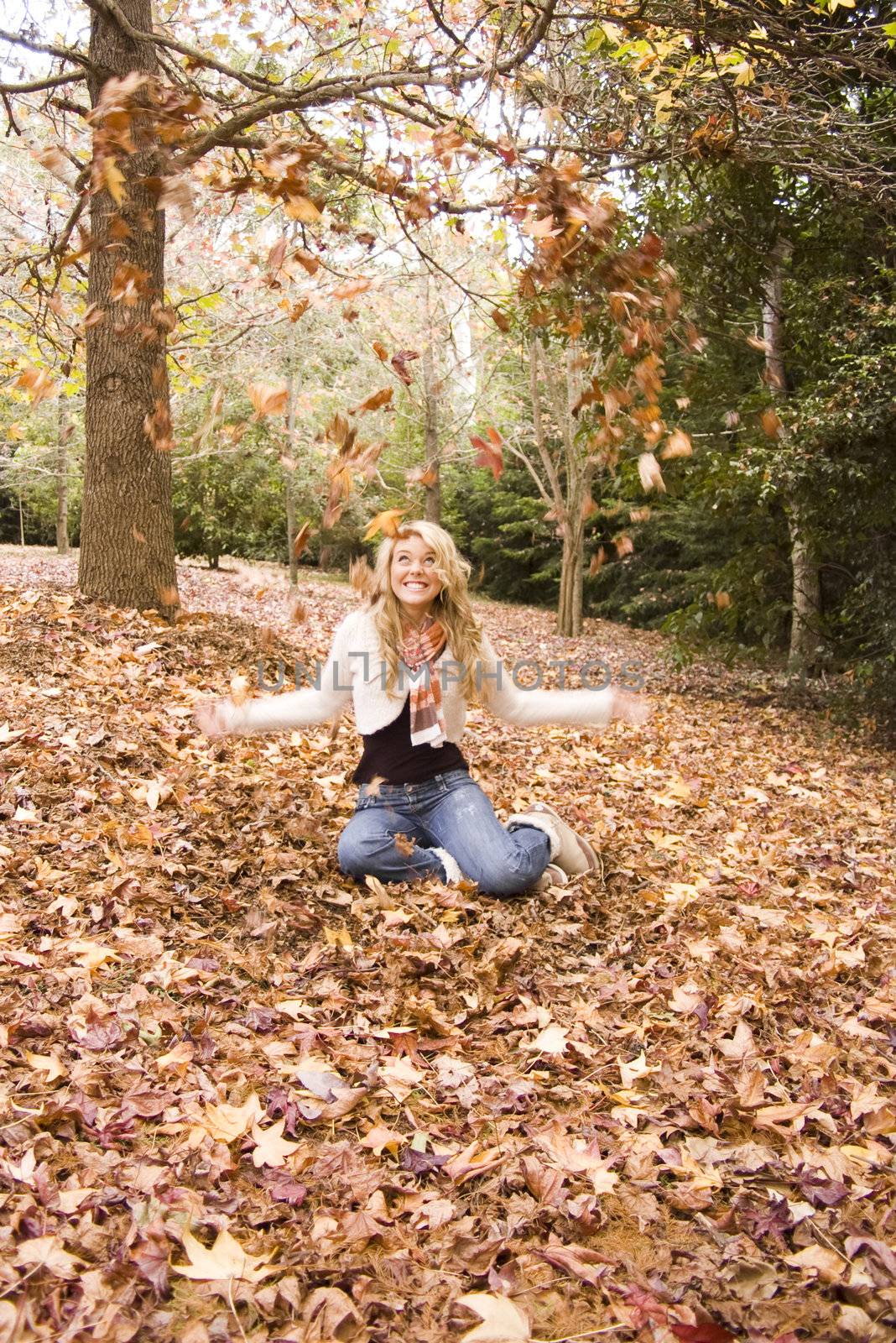 pretty girl in the park during autumn