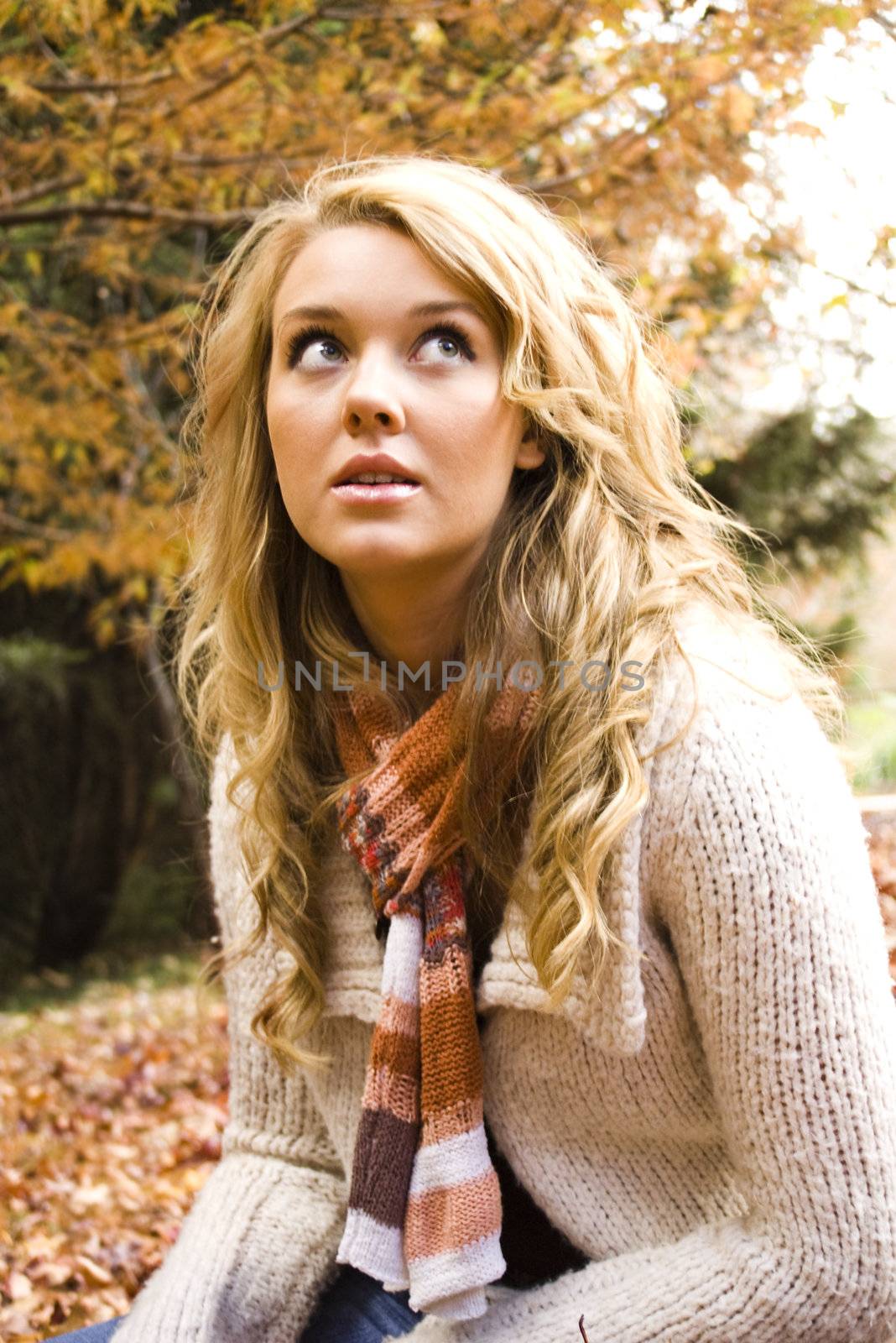 pretty girl in the park during autumn