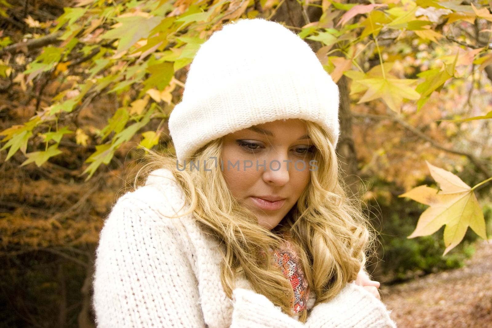 pretty girl in the park during autumn