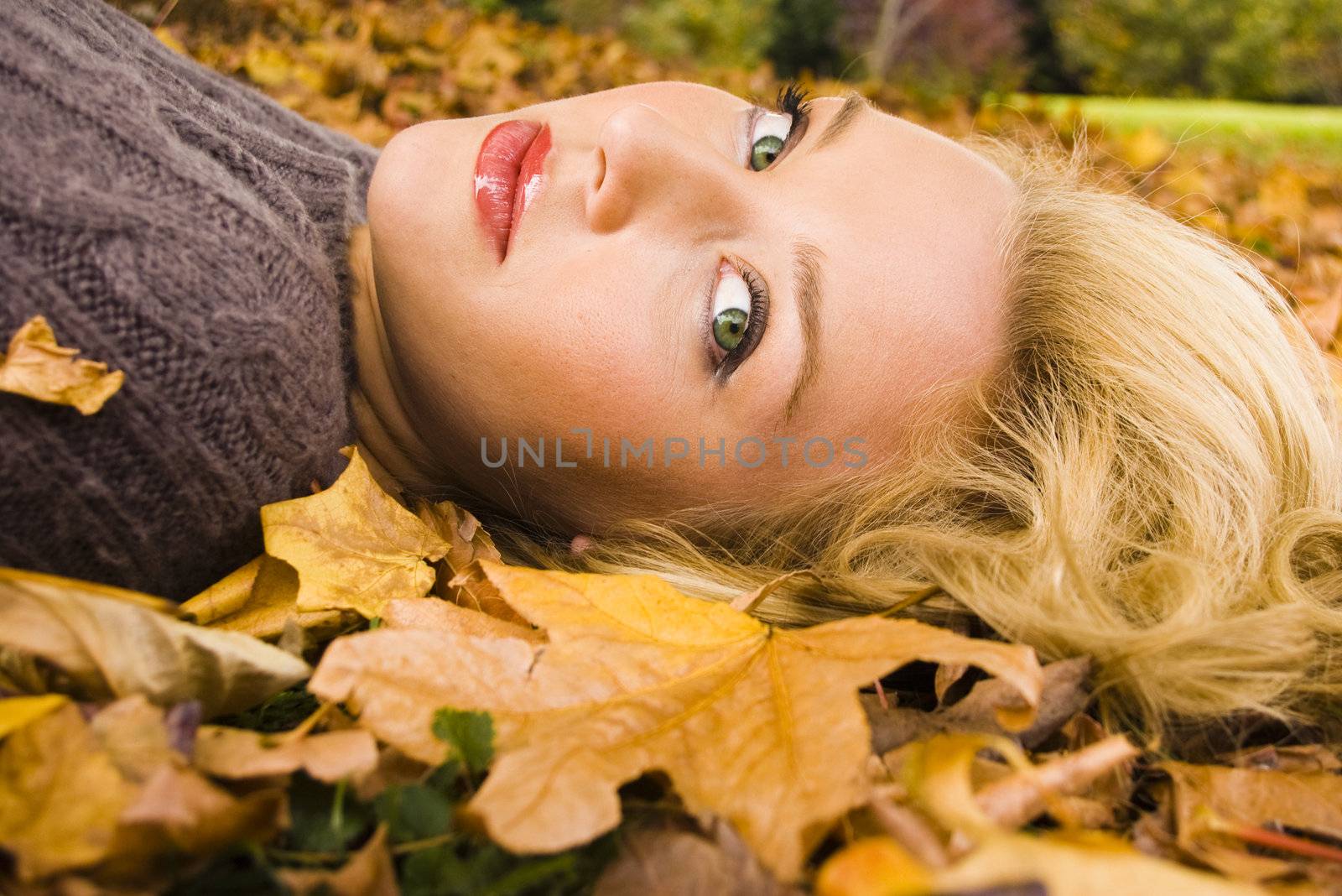 Girl in the Autumn leaves by angietakespics