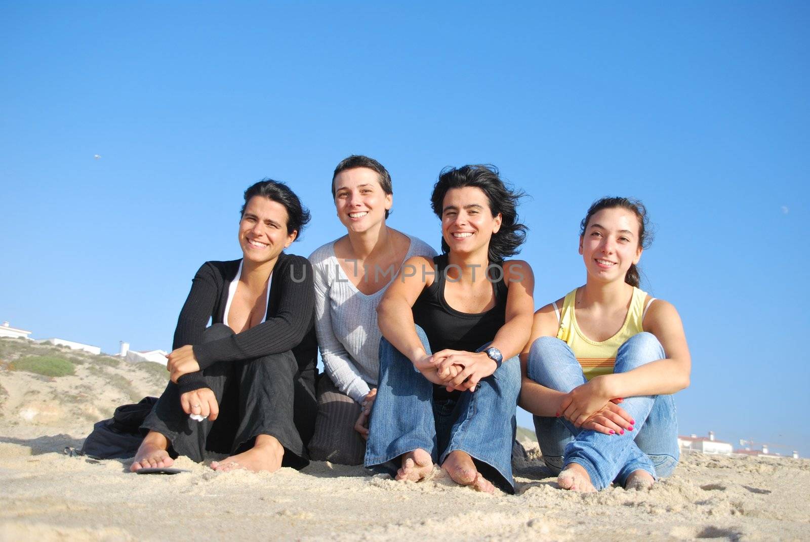 Smiling sisters at the beach by luissantos84