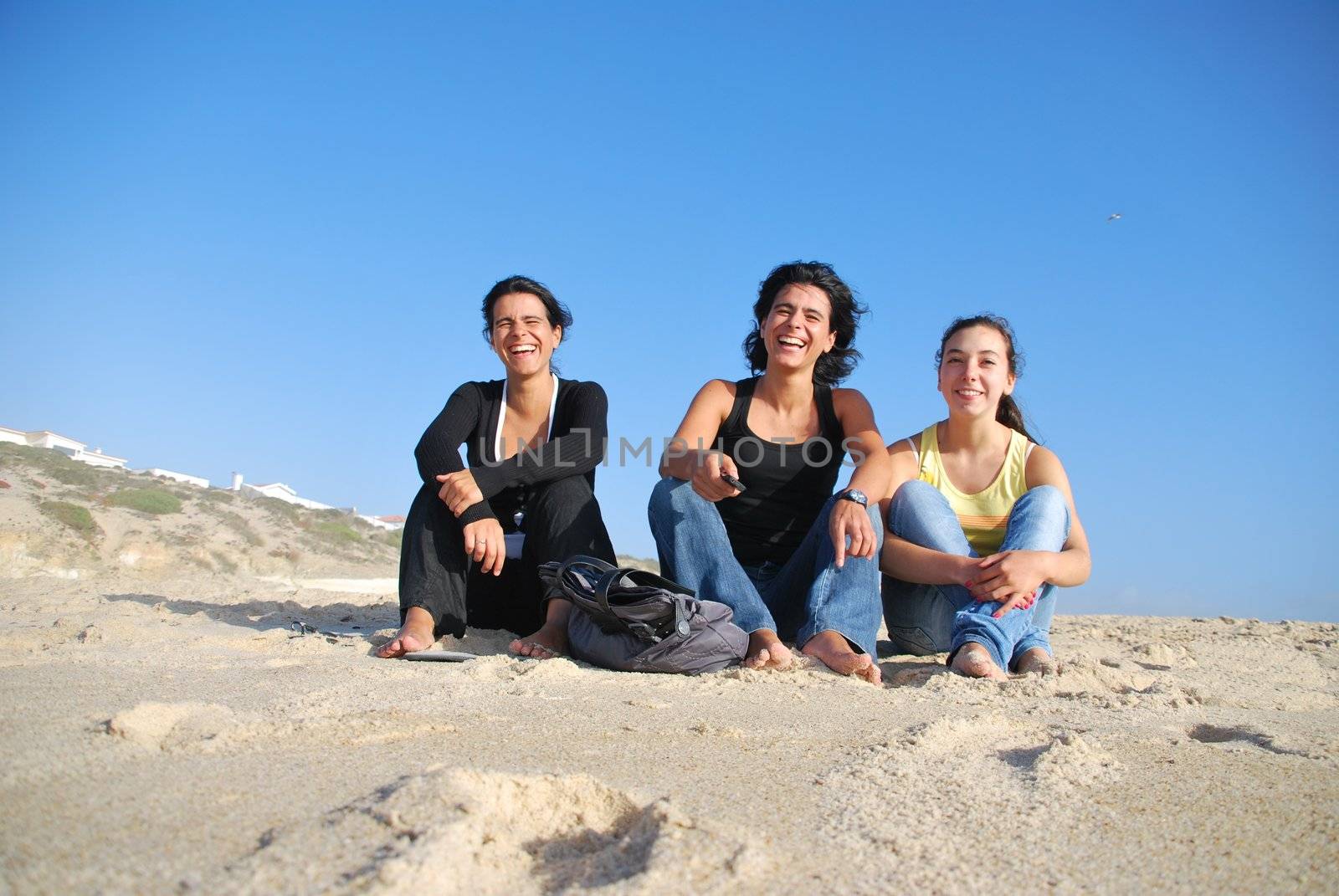 Smiling sisters at the beach by luissantos84