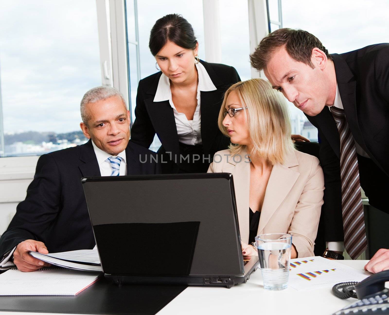 Business team at the meeting discussing work