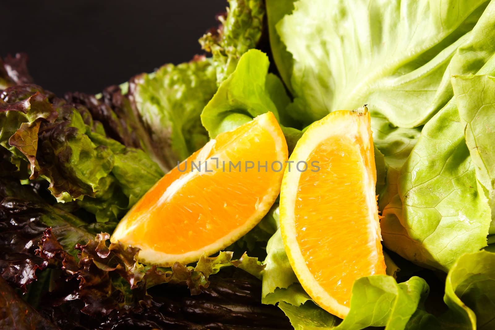 Composition of fruits and vegetables lettuce and orange