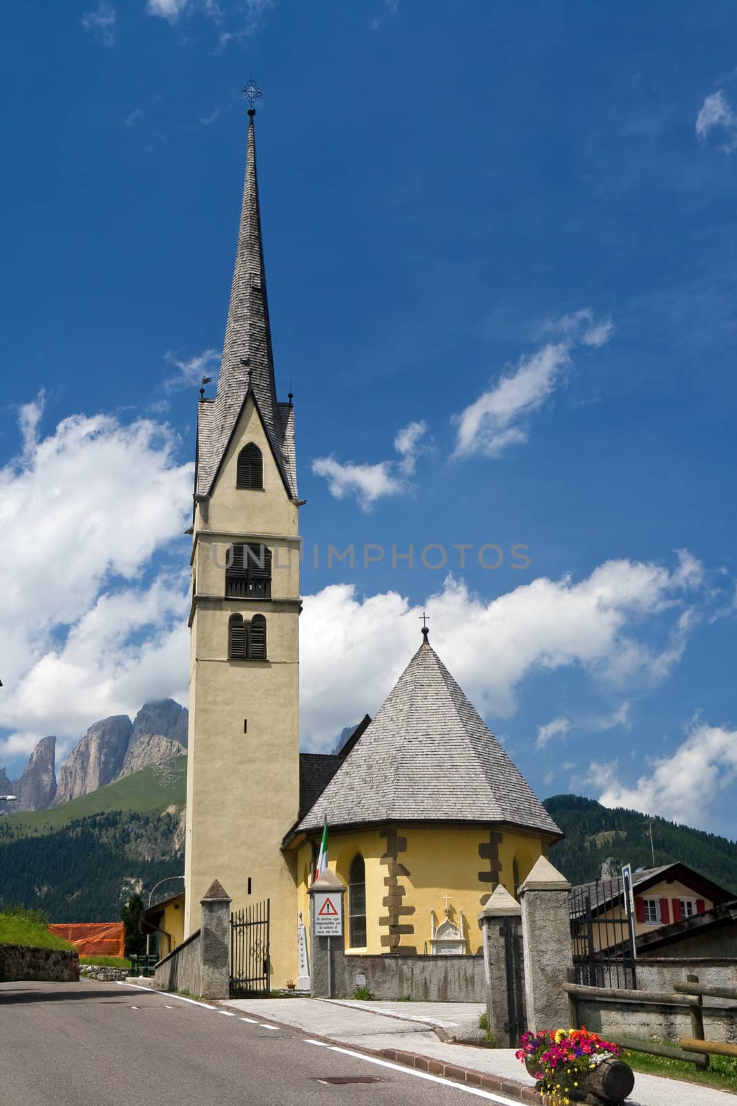 small church in Alba di Canazei, Trentino, Italy. Canazei is a famuos small town in val di Fassa, Italian dolomites. Photo taken with polarized filter