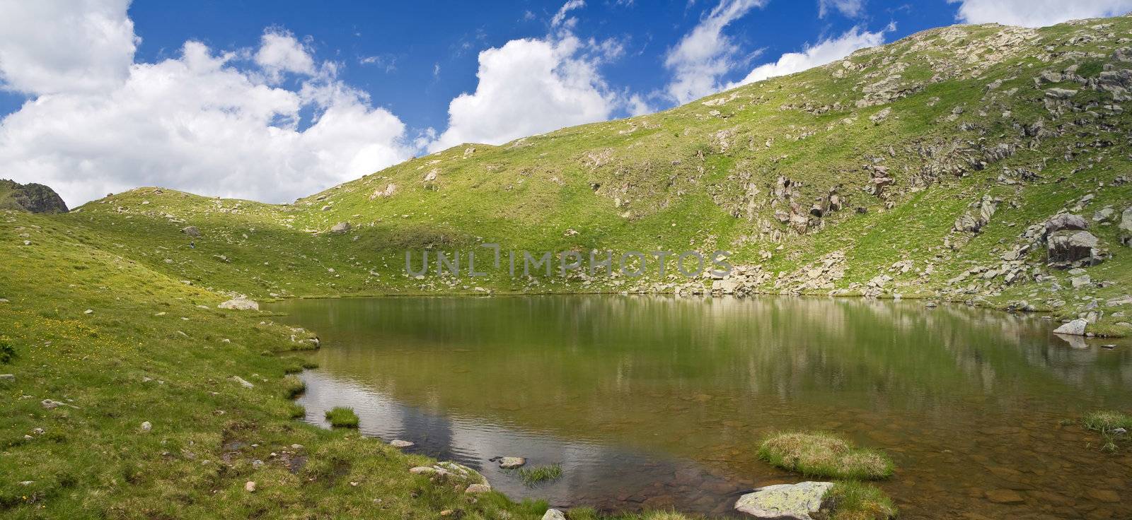 summer view of Lusia lakes, in val di Fassa, Italian dolomites. Photo taken with polarized filter