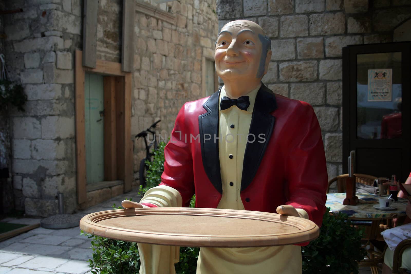 wooden waiter near the restaurant