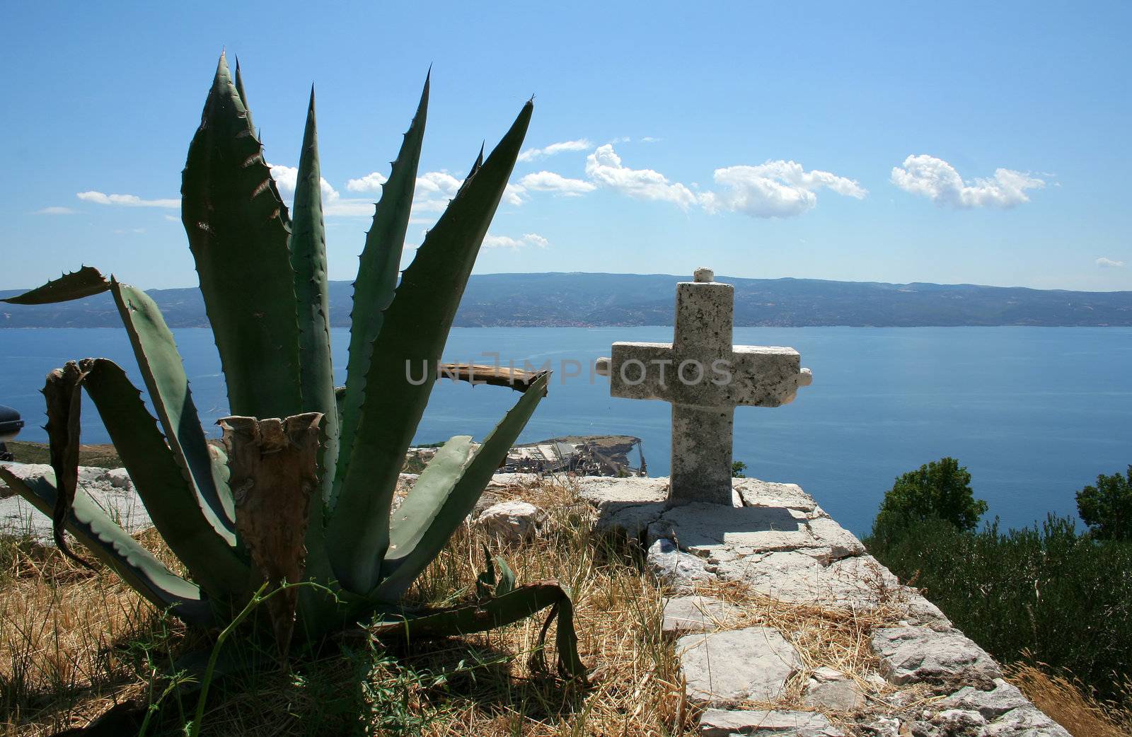 old cross in cemetery in Croatia