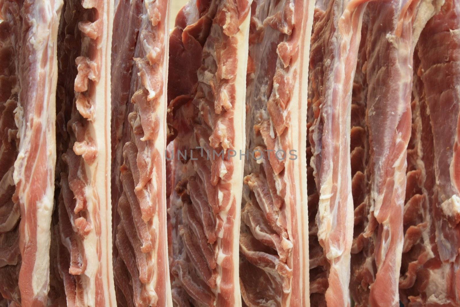 Meat in proces in a cold cut factory