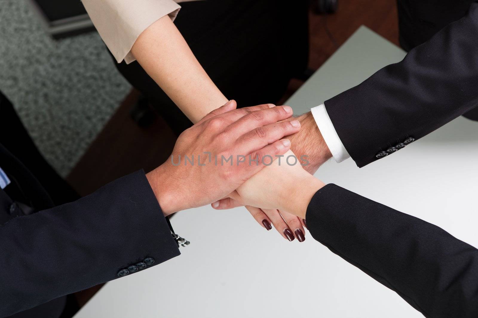 Business handshake over the deal. Taken from above