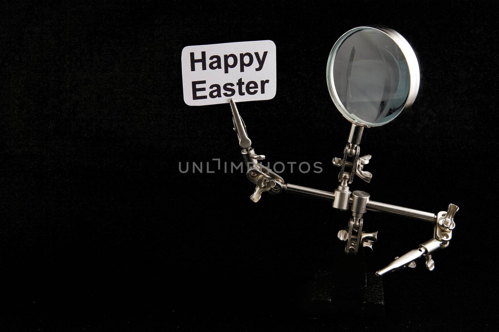 figure of steel man with "Happy Easter" inscription on black background