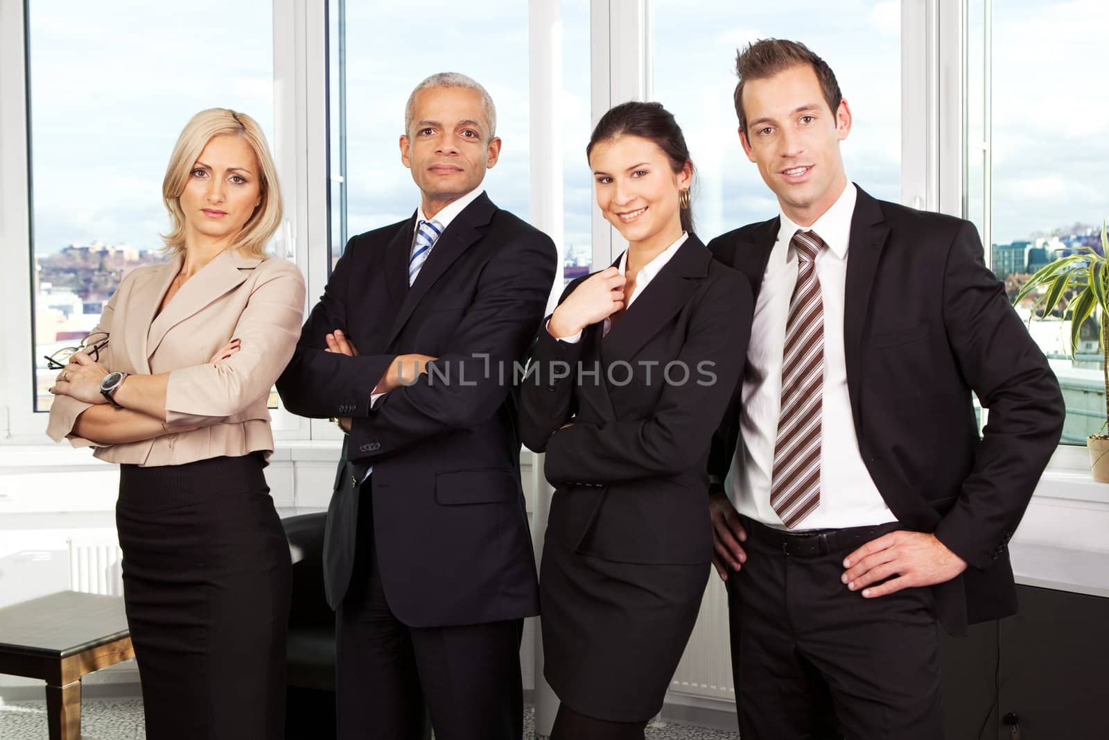 Successful business team by AndreyPopov